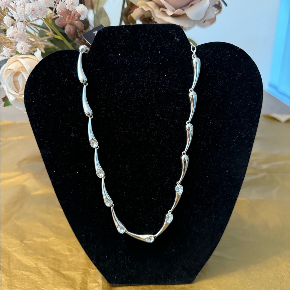 Silver toned necklace with CZ’s. NWT